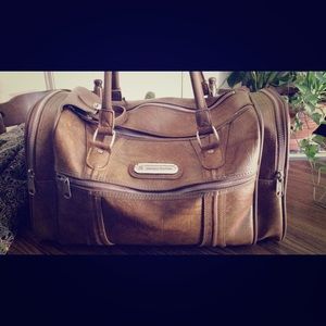 American Tourister overnight faux leather tan bag.